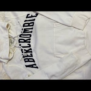 White Abercrombie kids sweatshirt with navy blue embroidery